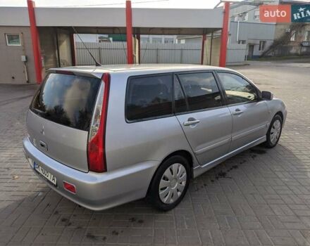 Сірий Міцубісі Lancer, об'ємом двигуна 1.58 л та пробігом 220 тис. км за 4499 $, фото 16 на Automoto.ua