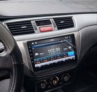 Серый Мицубиси Лансер, объемом двигателя 1.58 л и пробегом 223 тыс. км за 3200 $, фото 13 на Automoto.ua