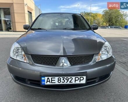 Сірий Міцубісі Lancer, об'ємом двигуна 1.59 л та пробігом 279 тис. км за 4999 $, фото 12 на Automoto.ua