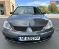 Сірий Міцубісі Lancer, об'ємом двигуна 1.59 л та пробігом 279 тис. км за 4999 $, фото 12 на Automoto.ua