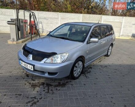 Сірий Міцубісі Lancer, об'ємом двигуна 1.58 л та пробігом 220 тис. км за 4499 $, фото 5 на Automoto.ua