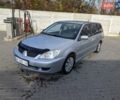 Сірий Міцубісі Lancer, об'ємом двигуна 1.58 л та пробігом 220 тис. км за 4499 $, фото 5 на Automoto.ua
