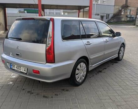 Сірий Міцубісі Lancer, об'ємом двигуна 1.58 л та пробігом 220 тис. км за 4499 $, фото 14 на Automoto.ua