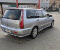 Сірий Міцубісі Lancer, об'ємом двигуна 1.58 л та пробігом 220 тис. км за 4499 $, фото 14 на Automoto.ua