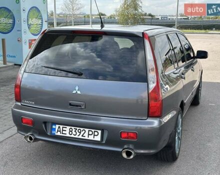 Сірий Міцубісі Lancer, об'ємом двигуна 1.59 л та пробігом 279 тис. км за 4999 $, фото 20 на Automoto.ua