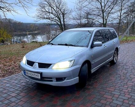 Серый Мицубиси Лансер, объемом двигателя 2 л и пробегом 346 тыс. км за 3900 $, фото 3 на Automoto.ua