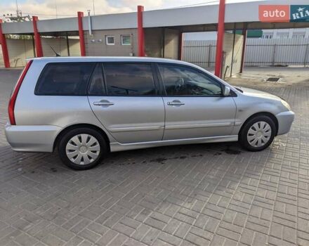 Сірий Міцубісі Lancer, об'ємом двигуна 1.58 л та пробігом 220 тис. км за 4499 $, фото 13 на Automoto.ua