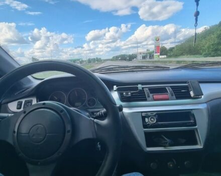 Сірий Міцубісі Lancer, об'ємом двигуна 2 л та пробігом 297 тис. км за 4400 $, фото 7 на Automoto.ua