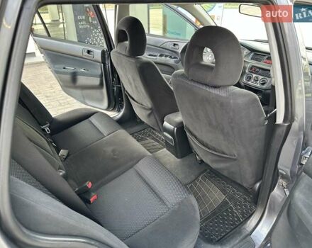 Сірий Міцубісі Lancer, об'ємом двигуна 1.59 л та пробігом 279 тис. км за 4999 $, фото 31 на Automoto.ua