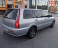 Сірий Міцубісі Lancer, об'ємом двигуна 1.58 л та пробігом 258 тис. км за 2999 $, фото 5 на Automoto.ua