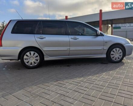 Сірий Міцубісі Lancer, об'ємом двигуна 1.58 л та пробігом 220 тис. км за 4499 $, фото 12 на Automoto.ua