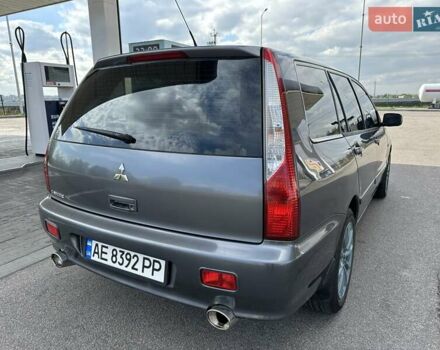 Сірий Міцубісі Lancer, об'ємом двигуна 1.59 л та пробігом 279 тис. км за 4999 $, фото 15 на Automoto.ua