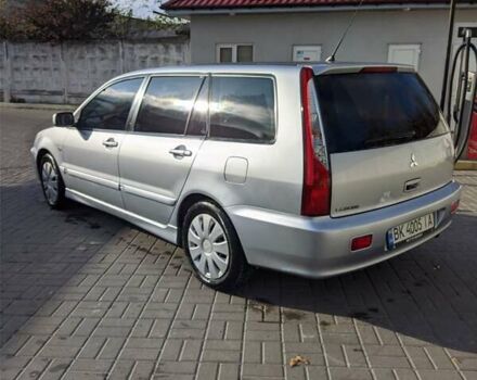Сірий Міцубісі Lancer, об'ємом двигуна 1.58 л та пробігом 220 тис. км за 4499 $, фото 17 на Automoto.ua