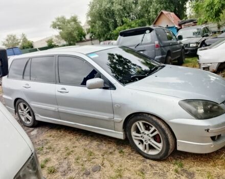 Серый Мицубиси Лансер, объемом двигателя 2 л и пробегом 3 тыс. км за 4520 $, фото 1 на Automoto.ua