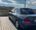 Серый Мицубиси Лансер, объемом двигателя 1.6 л и пробегом 255 тыс. км за 4500 $, фото 1 на Automoto.ua