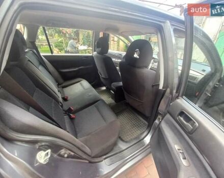 Сірий Міцубісі Lancer, об'ємом двигуна 1.6 л та пробігом 279 тис. км за 5800 $, фото 9 на Automoto.ua