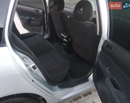 Сірий Міцубісі Lancer, об'ємом двигуна 1.58 л та пробігом 258 тис. км за 2999 $, фото 14 на Automoto.ua