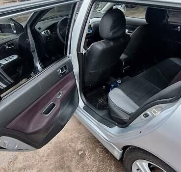 Серый Мицубиси Лансер, объемом двигателя 1.58 л и пробегом 223 тыс. км за 3200 $, фото 7 на Automoto.ua