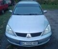 Сірий Міцубісі Lancer, об'ємом двигуна 1.6 л та пробігом 399 тис. км за 2950 $, фото 4 на Automoto.ua