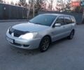 Сірий Міцубісі Lancer, об'ємом двигуна 1.58 л та пробігом 258 тис. км за 2999 $, фото 9 на Automoto.ua