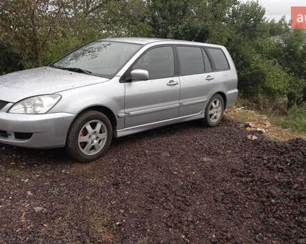 Серый Мицубиси Лансер, объемом двигателя 1.58 л и пробегом 296 тыс. км за 3850 $, фото 1 на Automoto.ua