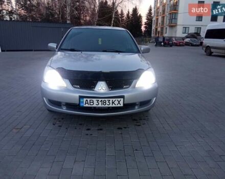 Сірий Міцубісі Lancer, об'ємом двигуна 1.58 л та пробігом 258 тис. км за 2999 $, фото 7 на Automoto.ua