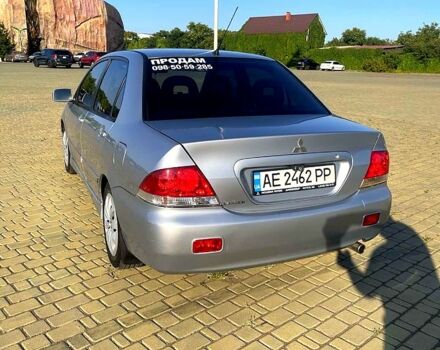 Сірий Міцубісі Lancer, об'ємом двигуна 1.6 л та пробігом 241 тис. км за 4950 $, фото 6 на Automoto.ua