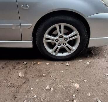 Серый Мицубиси Лансер, объемом двигателя 1.58 л и пробегом 223 тыс. км за 3200 $, фото 9 на Automoto.ua