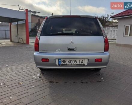 Сірий Міцубісі Lancer, об'ємом двигуна 1.58 л та пробігом 220 тис. км за 4499 $, фото 21 на Automoto.ua
