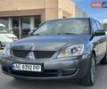 Сірий Міцубісі Lancer, об'ємом двигуна 1.59 л та пробігом 279 тис. км за 4999 $, фото 4 на Automoto.ua