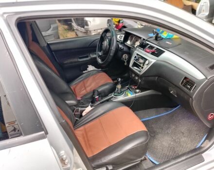 Серый Мицубиси Лансер, объемом двигателя 2 л и пробегом 3 тыс. км за 4520 $, фото 4 на Automoto.ua