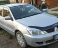 Сірий Міцубісі Lancer, об'ємом двигуна 1.6 л та пробігом 185 тис. км за 3699 $, фото 1 на Automoto.ua