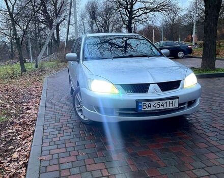 Серый Мицубиси Лансер, объемом двигателя 2 л и пробегом 346 тыс. км за 3900 $, фото 5 на Automoto.ua