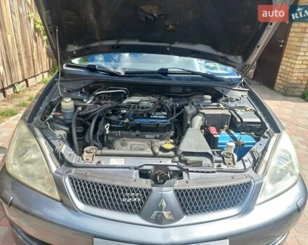 Сірий Міцубісі Lancer, об'ємом двигуна 1.6 л та пробігом 279 тис. км за 5800 $, фото 28 на Automoto.ua
