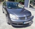 Сірий Міцубісі Lancer, об'ємом двигуна 1.58 л та пробігом 240 тис. км за 4100 $, фото 3 на Automoto.ua