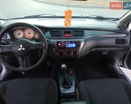 Сірий Міцубісі Lancer, об'ємом двигуна 1.58 л та пробігом 258 тис. км за 2999 $, фото 11 на Automoto.ua