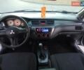 Сірий Міцубісі Lancer, об'ємом двигуна 1.58 л та пробігом 258 тис. км за 2999 $, фото 11 на Automoto.ua