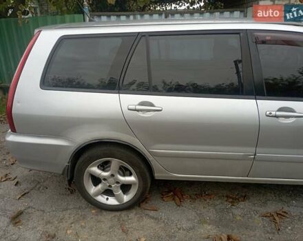 Серый Мицубиси Лансер, объемом двигателя 1.6 л и пробегом 350 тыс. км за 3000 $, фото 7 на Automoto.ua