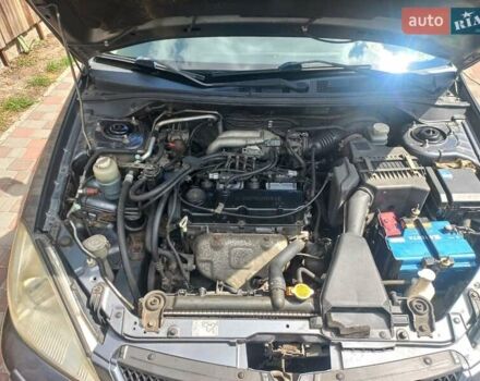 Сірий Міцубісі Lancer, об'ємом двигуна 1.6 л та пробігом 279 тис. км за 5800 $, фото 30 на Automoto.ua