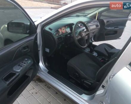 Сірий Міцубісі Lancer, об'ємом двигуна 1.58 л та пробігом 258 тис. км за 2999 $, фото 10 на Automoto.ua