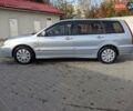 Сірий Міцубісі Lancer, об'ємом двигуна 1.58 л та пробігом 220 тис. км за 4499 $, фото 7 на Automoto.ua