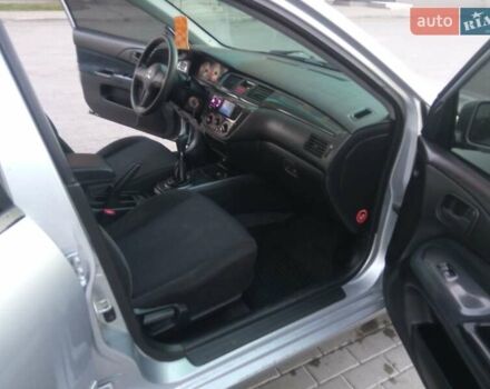 Сірий Міцубісі Lancer, об'ємом двигуна 1.58 л та пробігом 258 тис. км за 2999 $, фото 17 на Automoto.ua