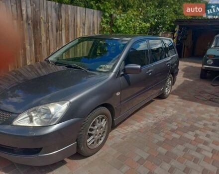 Сірий Міцубісі Lancer, об'ємом двигуна 1.6 л та пробігом 279 тис. км за 5800 $, фото 26 на Automoto.ua