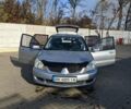 Сірий Міцубісі Lancer, об'ємом двигуна 1.58 л та пробігом 220 тис. км за 4499 $, фото 24 на Automoto.ua