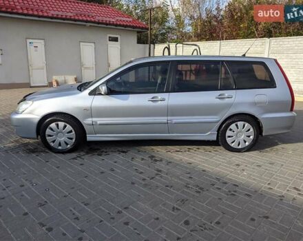 Сірий Міцубісі Lancer, об'ємом двигуна 1.58 л та пробігом 220 тис. км за 4499 $, фото 6 на Automoto.ua