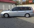 Сірий Міцубісі Lancer, об'ємом двигуна 1.58 л та пробігом 220 тис. км за 4499 $, фото 6 на Automoto.ua