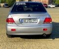 Сірий Міцубісі Lancer, об'ємом двигуна 1.6 л та пробігом 241 тис. км за 4950 $, фото 5 на Automoto.ua