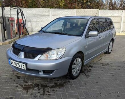 Сірий Міцубісі Lancer, об'ємом двигуна 1.58 л та пробігом 220 тис. км за 4499 $, фото 4 на Automoto.ua