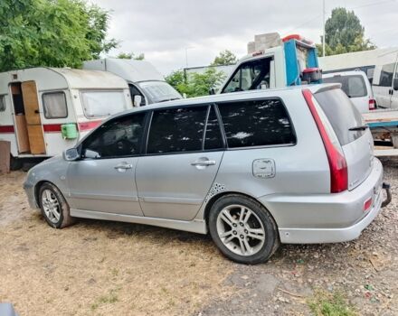 Серый Мицубиси Лансер, объемом двигателя 2 л и пробегом 3 тыс. км за 4520 $, фото 2 на Automoto.ua