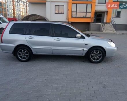 Сірий Міцубісі Lancer, об'ємом двигуна 1.58 л та пробігом 258 тис. км за 2999 $, фото 6 на Automoto.ua